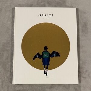Gucci Gift Catalog Hardcover Book with Gold and Black Design